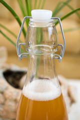 Glass bottle with sparkling kombucha