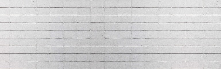 Panorama of White block cement fence wall pattern and seamless background
