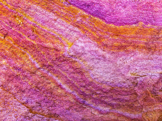 texture,Rock layers colorful background,texture.,pink,orange, yellow sedimentary rocks,colourful rock layers formed through cementation deposition,abstract design backgrounds,patterns