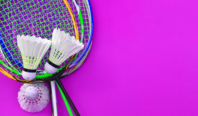 Badminton rackets and badminton shuttlecocks feather balls.