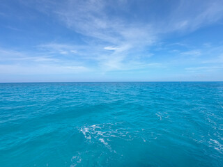 Fototapeta na wymiar Blue Cloudy Sky on the Ocean