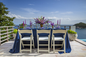 Purple and Gold Romantic Wedding Table Top Layout Table Spread no people no human tropical location copy space sea view trees and jungle ocean