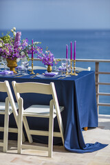 Purple and Gold Romantic Wedding Table Top Layout Table Spread no people no human tropical location copy space sea view trees and jungle ocean