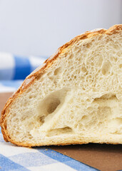 A slice of fresh white crunchy bread. Close-up