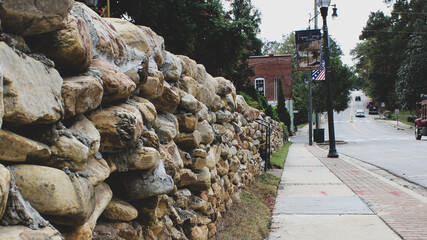 Fototapeta na wymiar stone wall in the town