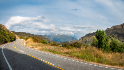 Panorama at Haast Pass on Makarora Country Road (Highway 6) in the morning, a scenic alpine road in Mount Aspiring National Park, Otago Region, New Zealand, South Island.