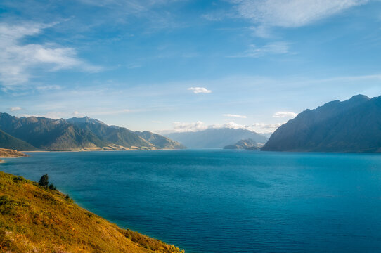 Panoramic view from Lake Hawea Lookout on a beautiful sunny morning in Mount Aspiring National Park, Otago Region, New Zealand, South Island.