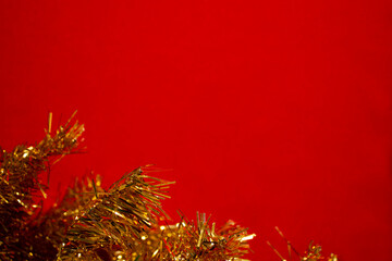 Template for a new year card with a Golden Christmas tree and a red background