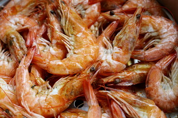 Prawns cooked in a steamer pot. Shrimps prawns steamed seafood is deliciously colorful. Close focus and select an object