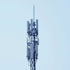 Telecommunication tower of 4G and 5G cellular. Macro Base Station. 5G radio network telecommunication equipment with radio modules and smart antennas mounted on a metal. 