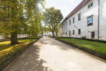 At the Courtyard of Trebon Castle. 
Renaissance palace in Trebon. Trebon is a historical town in South Bohemian Region. Czech Republic.
Nice sunny day during summer or autumn season.