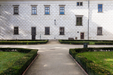 Fototapeta premium At the Courtyard of Trebon Castle. Renaissance palace in Trebon. Trebon is a historical town in South Bohemian Region. Czech Republic. Nice sunny day during summer or autumn season.