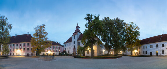 At the Courtyard of Trebon Castle. 
Renaissance palace in Trebon. Trebon is a historical town in South Bohemian Region. Czech Republic.
Nice sunny day during summer or autumn season.