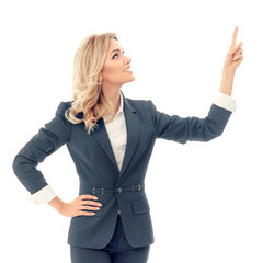 Portrait of businesswoman in grey confident suit, showing  something, some product or copy space for slogan or text message, isolated over white background. Square composition.