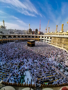 Muslim pilgrims from all around the World revolving around the Kaaba in April 2019 in Mecca Saudi Arabia. Muslim people praying together at the holy place