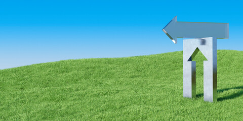 草原に立つ立体的な矢印のオブジェ ビジネスコンセプトの3Dレンダリンググラフィックス