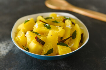 Cooked tapioca or Cassava root , Mandioca or Aipim, Kerala special Kappa Puzhukku or Kappa biryani South Indian food with spicy meat curry, beef tapioca, India. with Fish curry. root vegetable Brazil