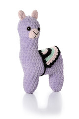 Knitted toy. Lilac lama on white background. Full depth of field. With clipping path.