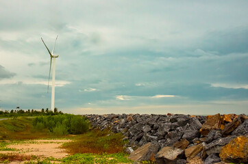 Fototapeta na wymiar wind turbine near the sea