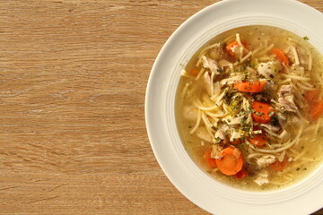 a delicious chicken soup with carrots