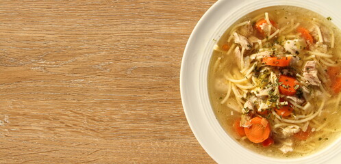 a delicious chicken soup with carrots