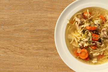 a delicious chicken soup with carrots