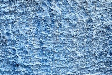 the pastel blue colour rough and sharp texture cement wall background