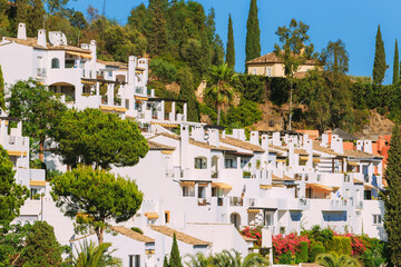 Fototapeta na wymiar Andalusia region, Spain. Summer View Of Village With White Houses. Real Estate