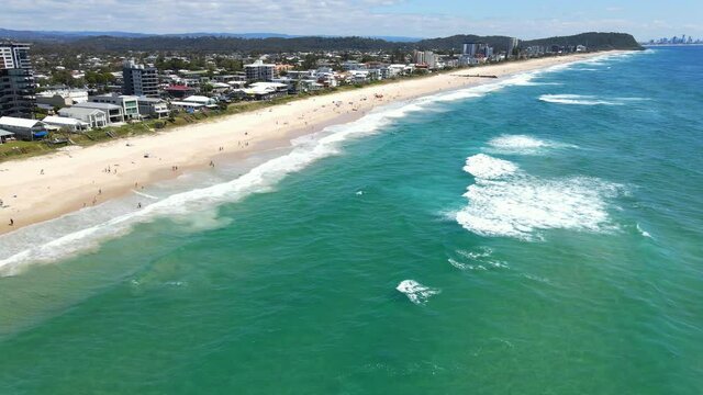 Seaside Village And Town Near Palm Beach - Waves In The Ocean - Gold Coast, QLD, Australia. - aerial drone shot
