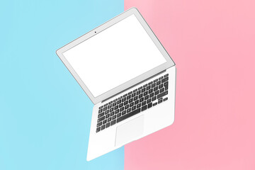 Modern laptop on color background
