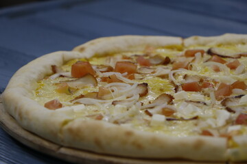 pizza on a wooden board