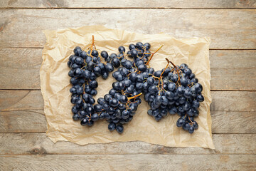 Composition with sweet ripe grapes on table