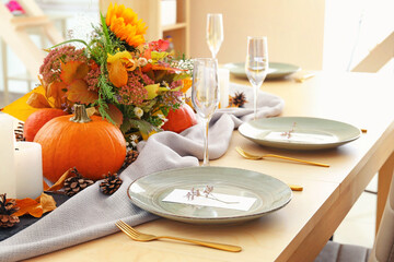 Beautiful table setting for Thanksgiving Day celebration in dining room
