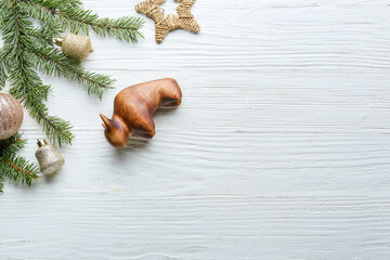 New Year composition with figurine of bull on wooden background