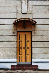 photo of a beautiful wooden door of an ancient building in Russia.