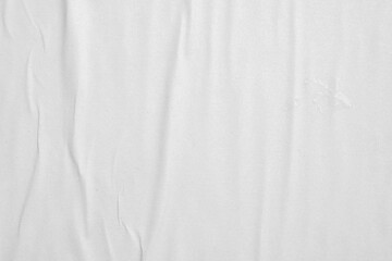Blank white crumpled and creased paper poster texture background