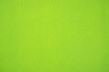 Yellow green wall in the house. Texture background.