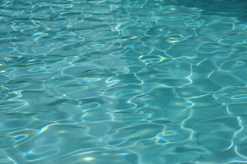 surface of blue swimming pool,background of water in swimming pool.