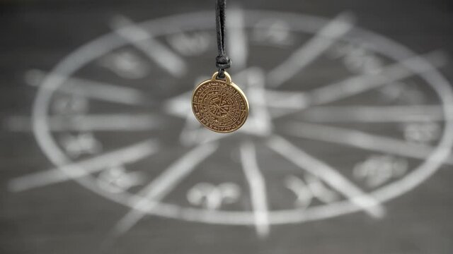 amulet of predictions on the background of the magic circle. helps in exchanging information with parallel worlds and foreseeing the future, serves to develop intuition. 