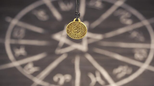 amulet of predictions on the background of the magic circle. helps in exchanging information with parallel worlds and foreseeing the future, serves to develop intuition. magic rite