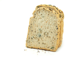 Fresh homemade slice of whole wheat bread isolated on a white background...