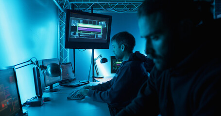 Hackers controlling hostile attack while working in hideout base