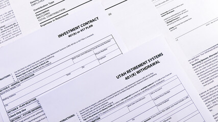 Obraz premium Conceptual composition. Pension savings. Blank form Investment contract 401 k or 457 plan, blank form Utah retirement system 401 k , Personal 401k plan and GSEPS 401k plan Opt-Out form. Close-up