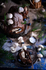 YULE LOG CAKE on a Christmas rustic background