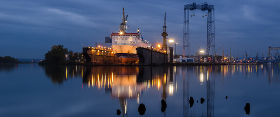 Fototapeta na wymiar PASSENGER FERRY - Ship in the shipyard under repair dock