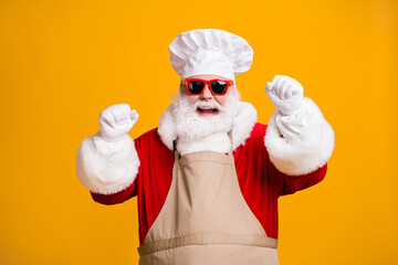 Photo of crazy santa claus with beard raise fists win tradition x-mas christmas advent lottery wear...