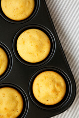 Homemade Cornbread Muffins, top view. Flat lay, overhead, from above. Close-up.