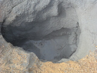 Naklejka premium Hiking in the dark and dramatic nature of Iceland's volcanoes, mountains, fjords, geysers and waterfalls