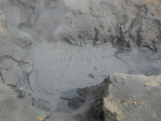 Hiking in the dark and dramatic nature of Iceland's volcanoes, mountains, fjords, geysers and waterfalls