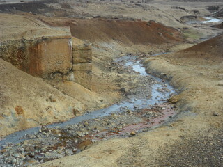 Hiking in the wild and dramatic landscapes of Iceland's fjords, volcanoes, mountains, geysers and waterfalls